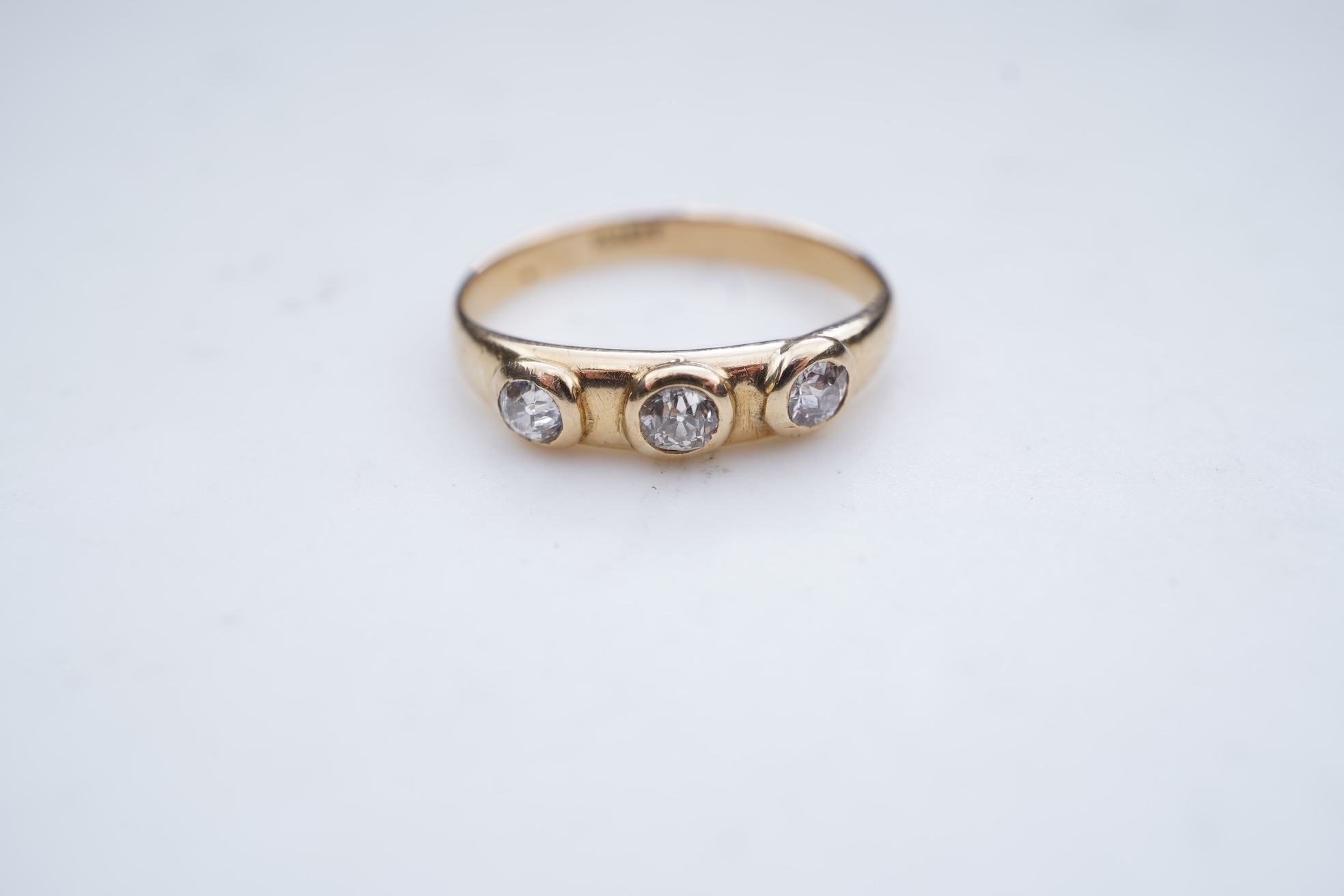 A three-stone diamond ring